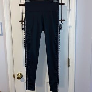 Zumba wear black leggings, slashed design down the sides, sz. S